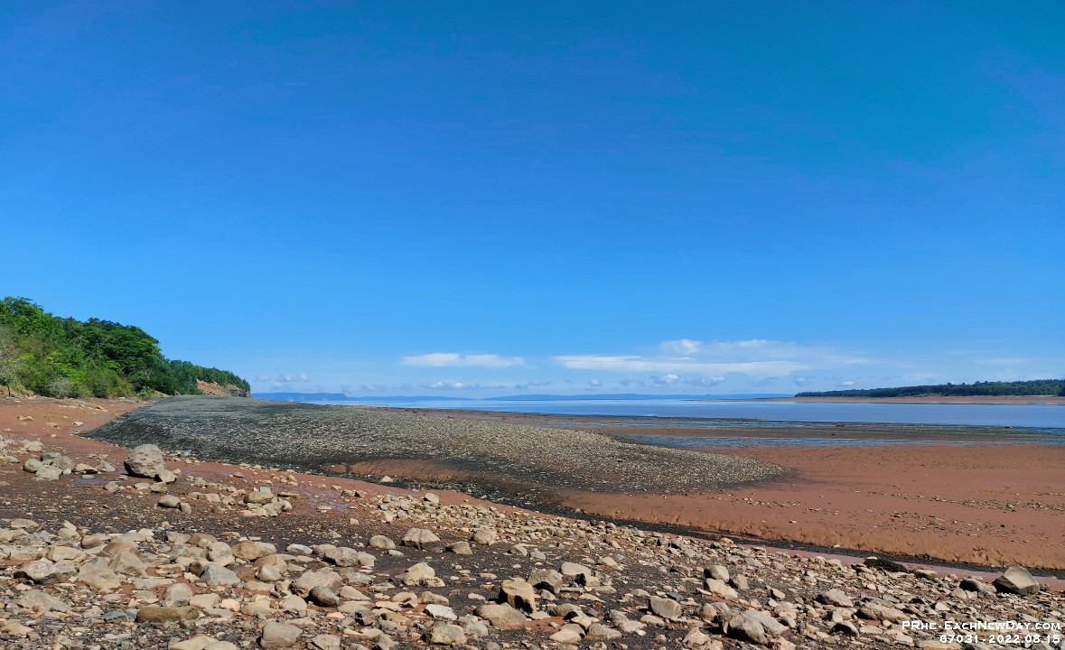 67031Cr - Walking on the shale and slate on Blue Beach at low tide, Hantsport, NS